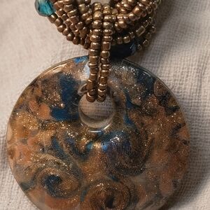Gold and Blue Swirling Pattern Necklace